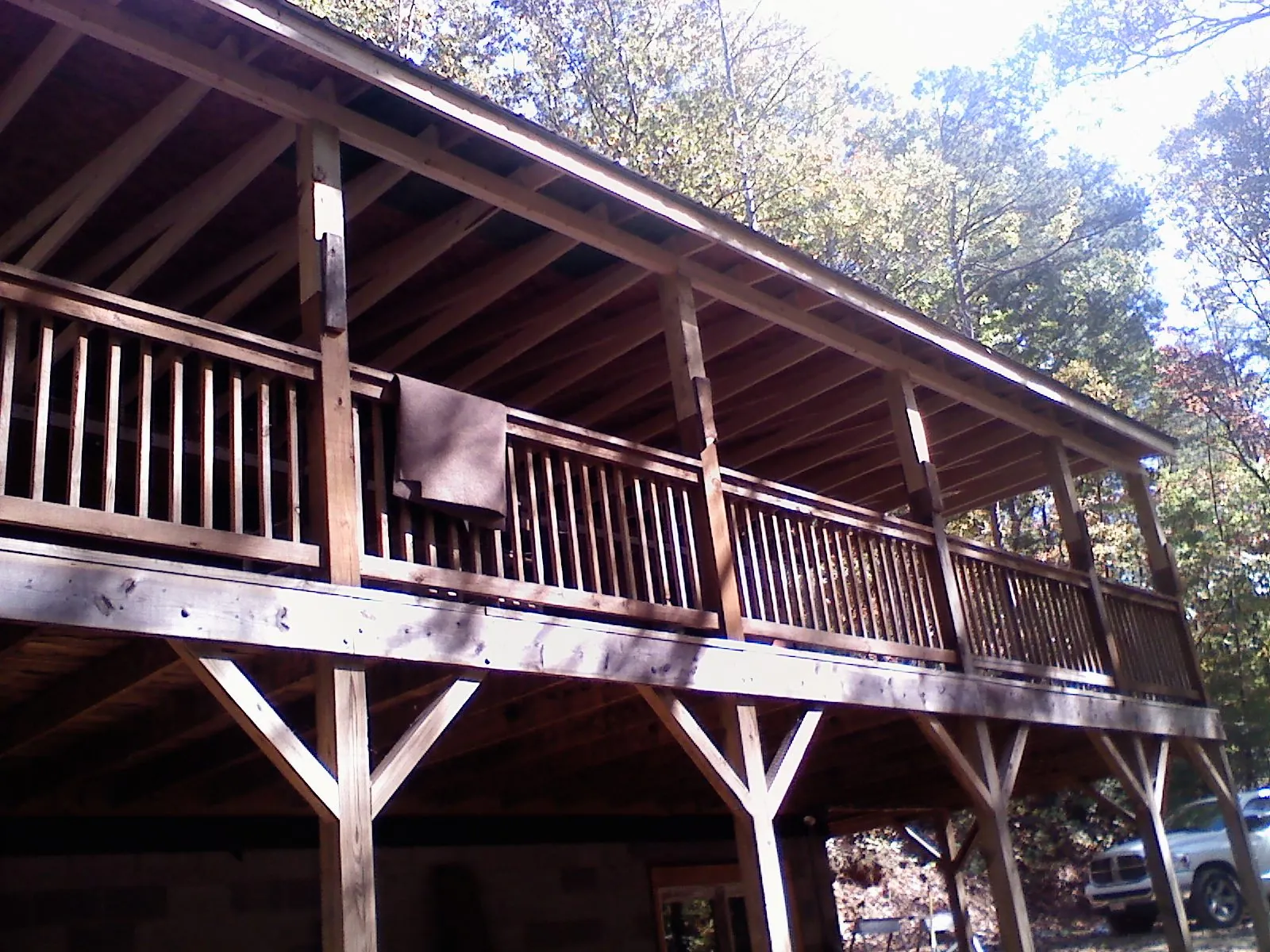 Timber framing under a new elevated porch and deck — Roof Leak Repair in Manzanita by Roofing Brothers